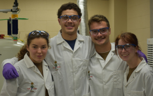 Chemical technologist assisting cadets in organic chemistry