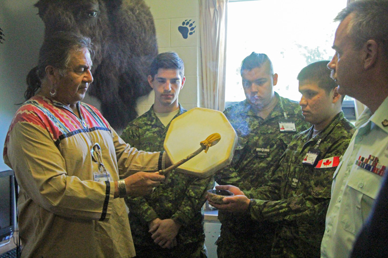 Aboriginal Leadership Opportunity Year (ALOY) officer cadets with Elder Bernard Nelson