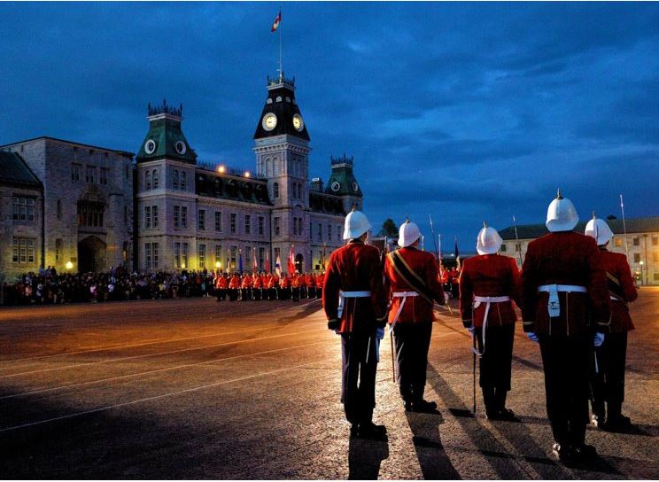 Cadets in scarlets in front of the McKenzie building
