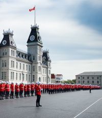 Photo galleries - Cadets in scarlets on parade in front of the historic McKenzie building