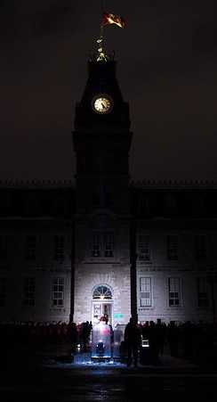 Vigil: Officer cadets hold a vigil at night in front of RMC’s clock tower on the National Day of Remembrance and Action on Violence Against Women. Vigil: Officer cadets hold a vigil at night in front of RMC’s clock tower on the National Day of Remembrance and Action on Violence Against Women.